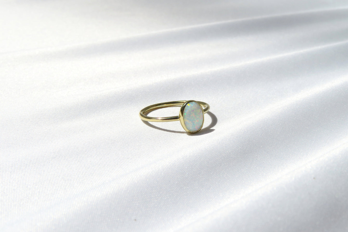 14k Gold 6x8mm Oval White Fire Opal Ring