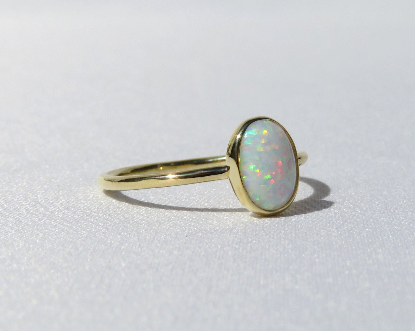 14k Gold 6x8mm Oval White Fire Opal Ring