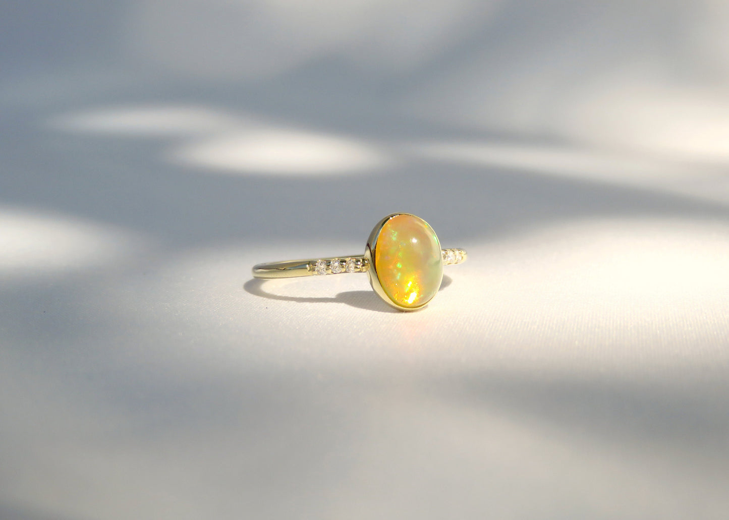 14k Gold 6x8mm Oval Natural Ethiopian Opal Ring with Diamond Accents