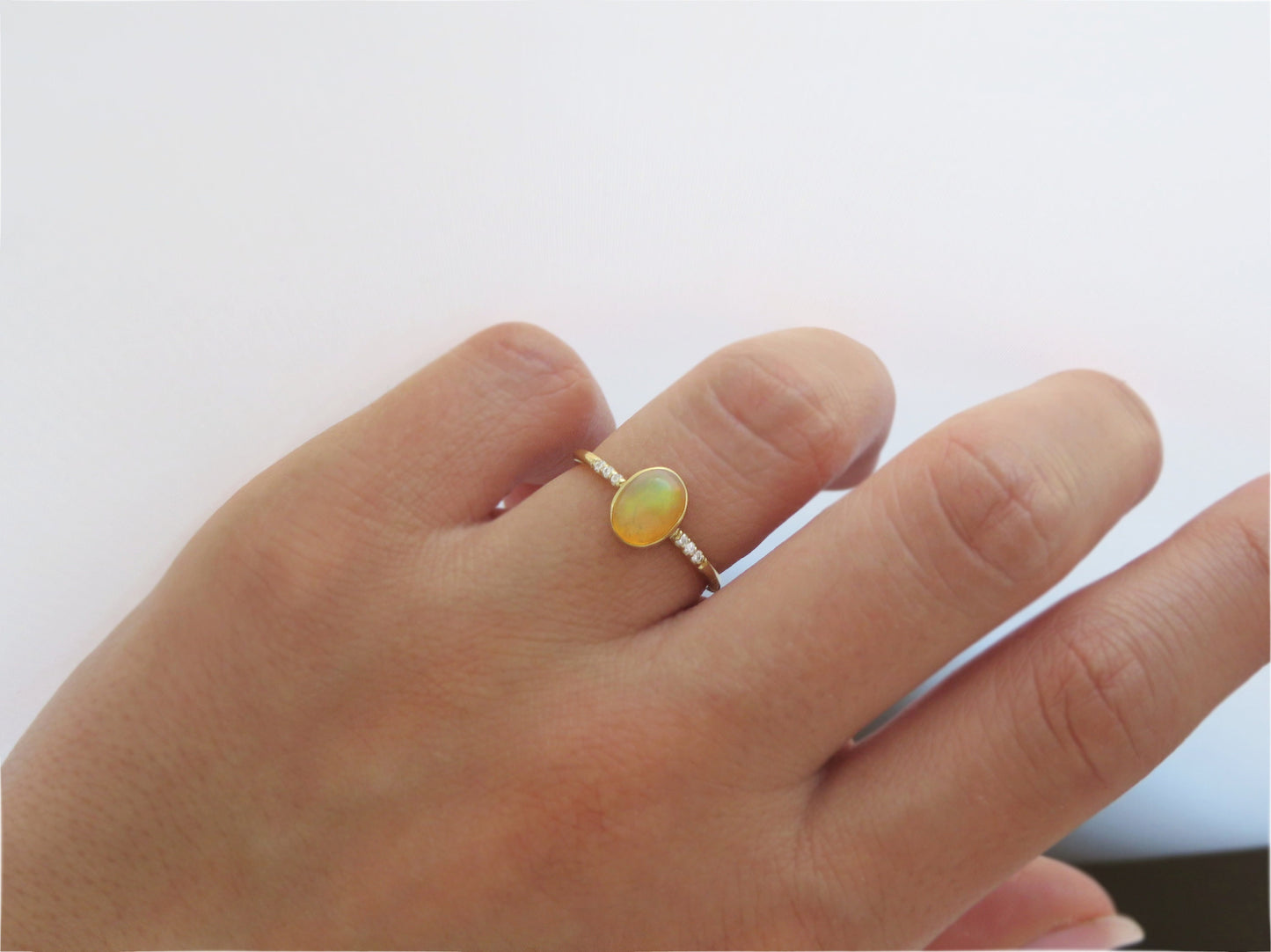 14k Gold 6x8mm Oval Natural Ethiopian Opal Ring with Diamond Accents
