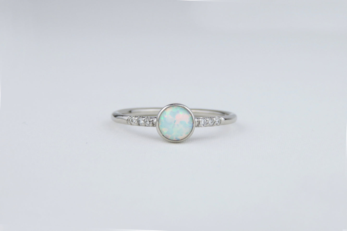 14k Gold 5mm Round White Fire Opal Ring with Diamond Accents