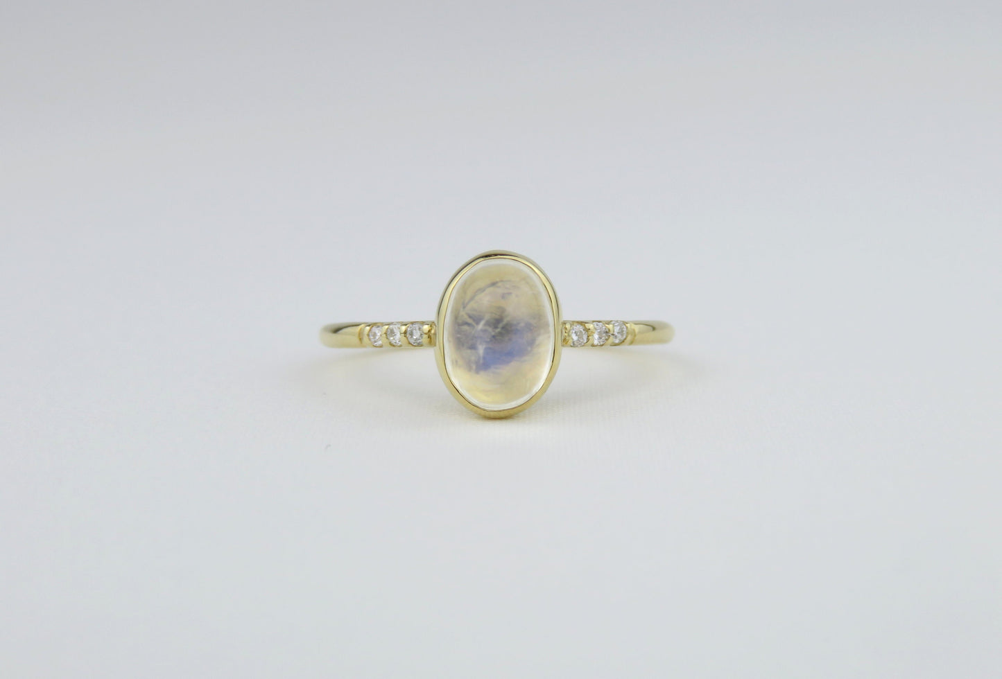 14k Gold 6x8mm Oval Rainbow Moonstone Ring with Diamond Accents
