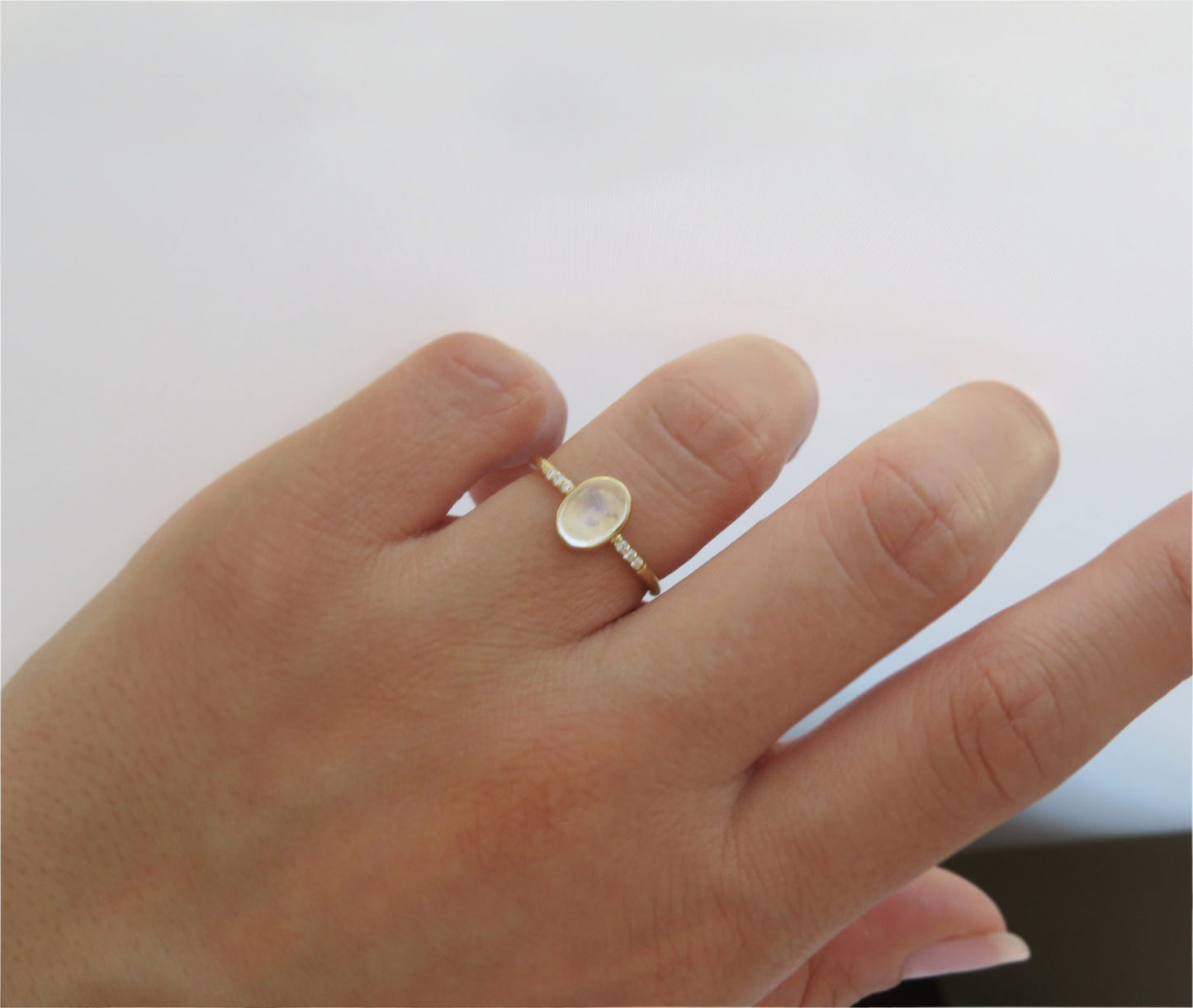 14k Gold 6x8mm Oval Rainbow Moonstone Ring with Diamond Accents