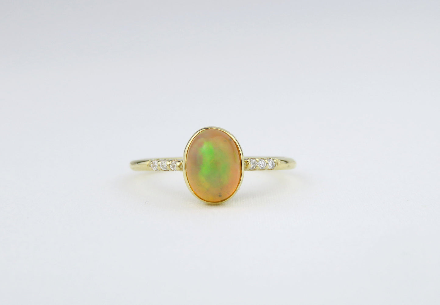 14k Gold 6x8mm Oval Natural Ethiopian Opal Ring with Diamond Accents