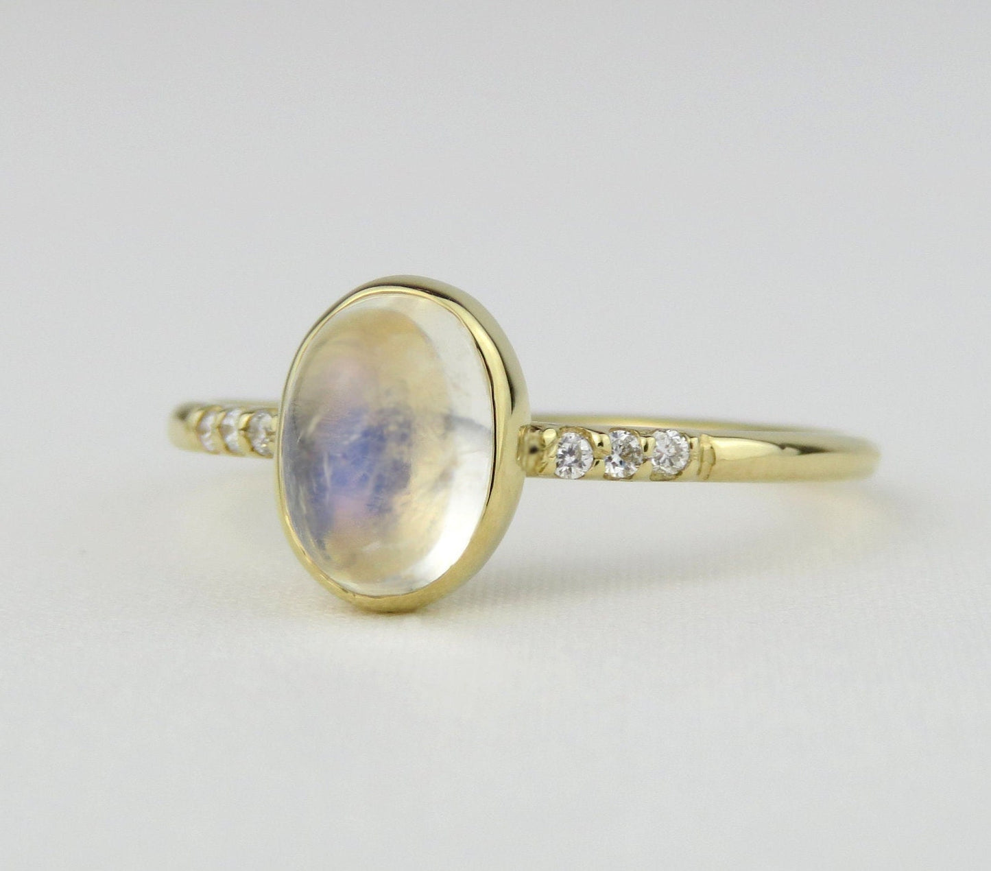 14k Gold 6x8mm Oval Rainbow Moonstone Ring with Diamond Accents