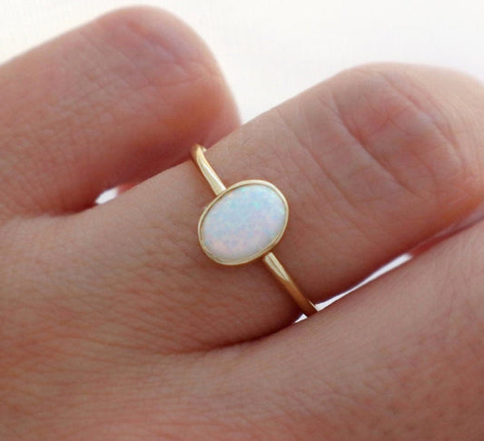 14k Gold 6x8mm Oval White Fire Opal Ring
