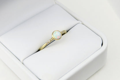 14k Gold 5mm Round White Fire Opal Ring with Diamond Accents