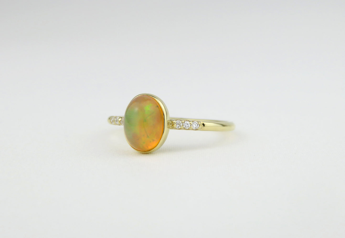 14k Gold 6x8mm Oval Natural Ethiopian Opal Ring with Diamond Accents