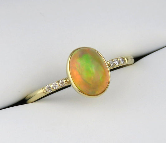 14k Gold 6x8mm Oval Natural Ethiopian Opal Ring with Diamond Accents