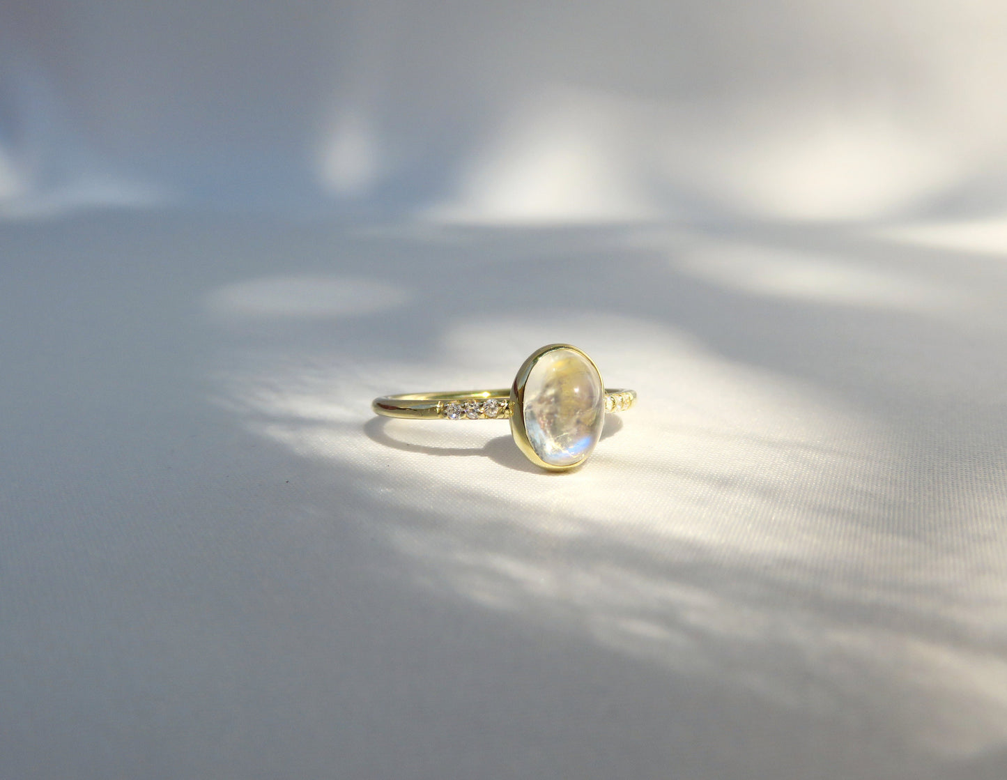 14k Gold 6x8mm Oval Rainbow Moonstone Ring with Diamond Accents